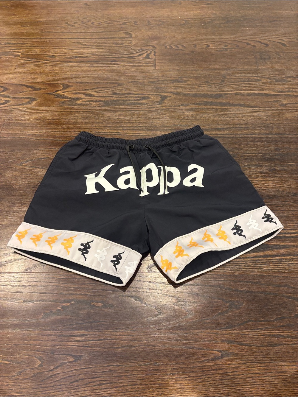 Kappa Boys Black Athletic Shorts with White Logo and Yellow Accent Tape Size 12